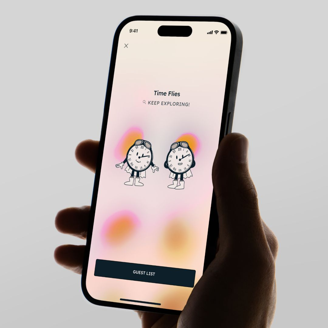 A hand holding a smartphone with a soft illustrated screen.